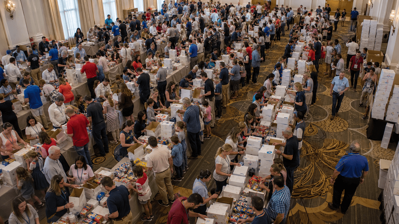 A team packing care packages for deployed service members at Operation You Matter